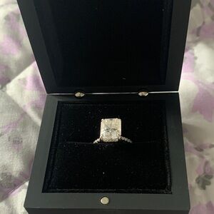 Elegant Emerald Cut Moissanite Diamond. Size 6